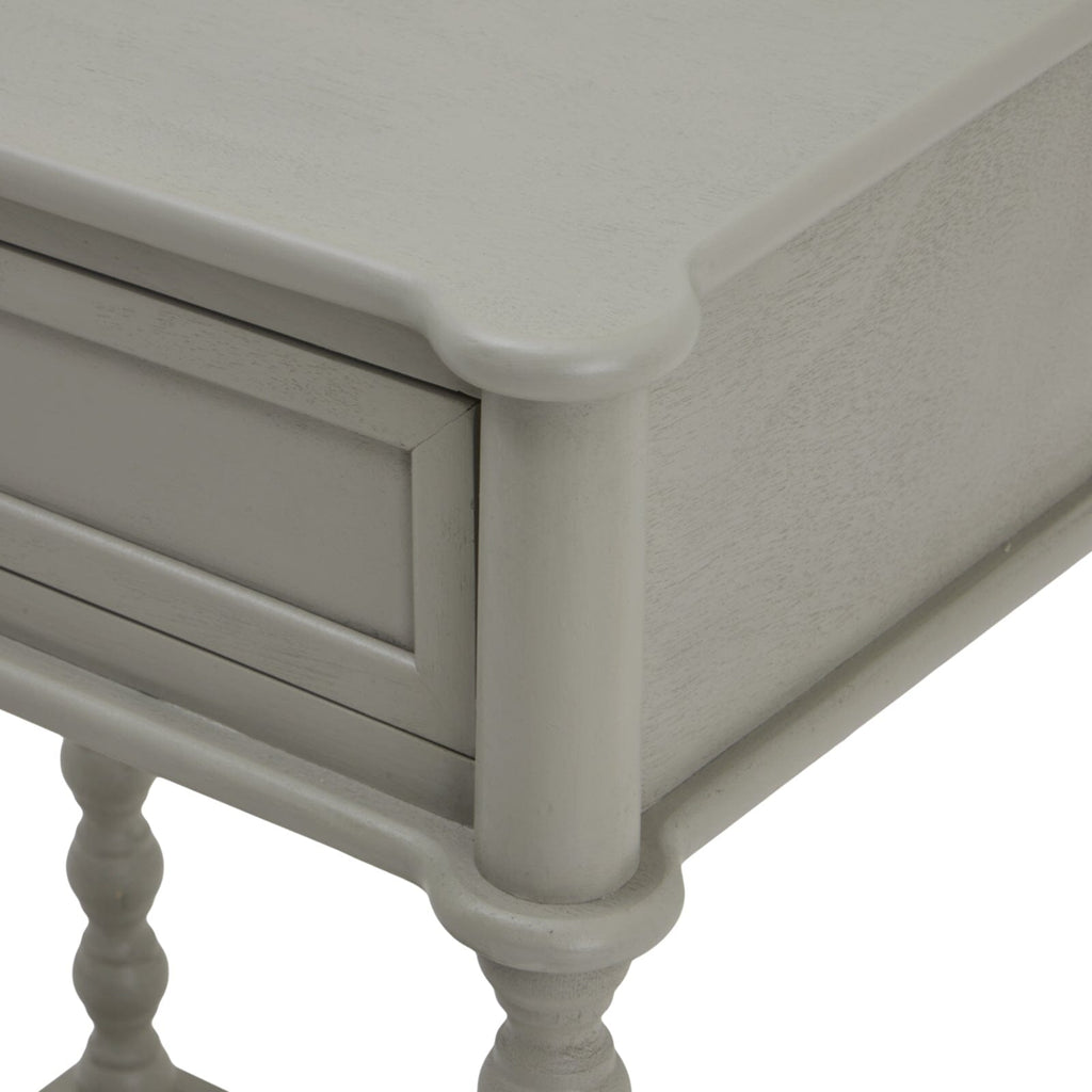 Grauer Nachttisch mit Beindetail